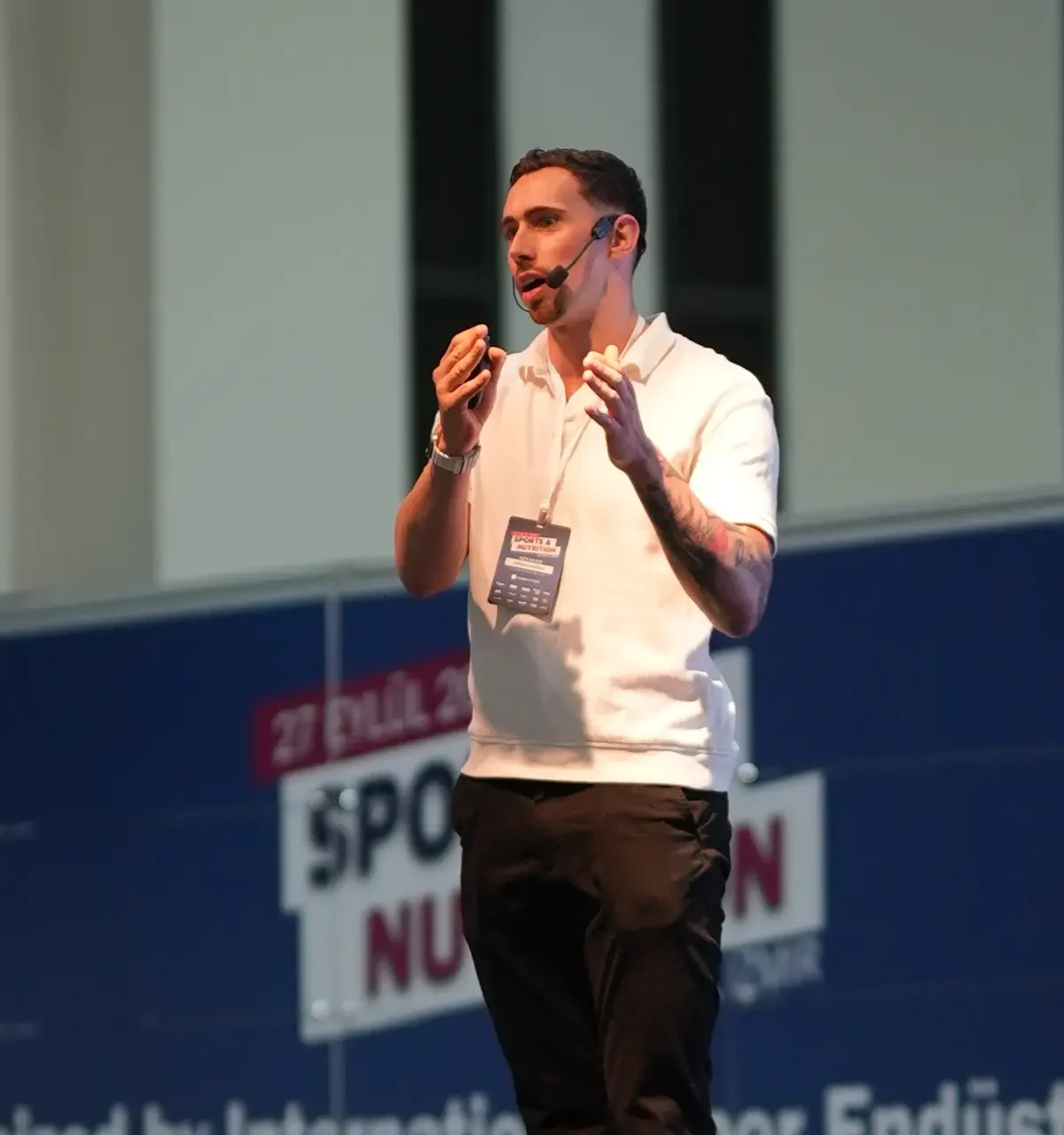 Nessan talking on stage