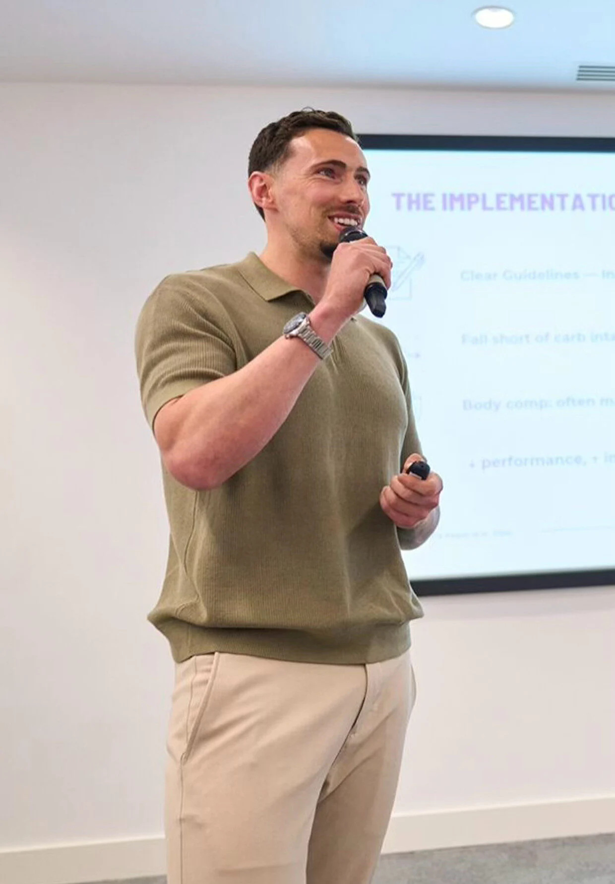 Nessan Speaking on stage